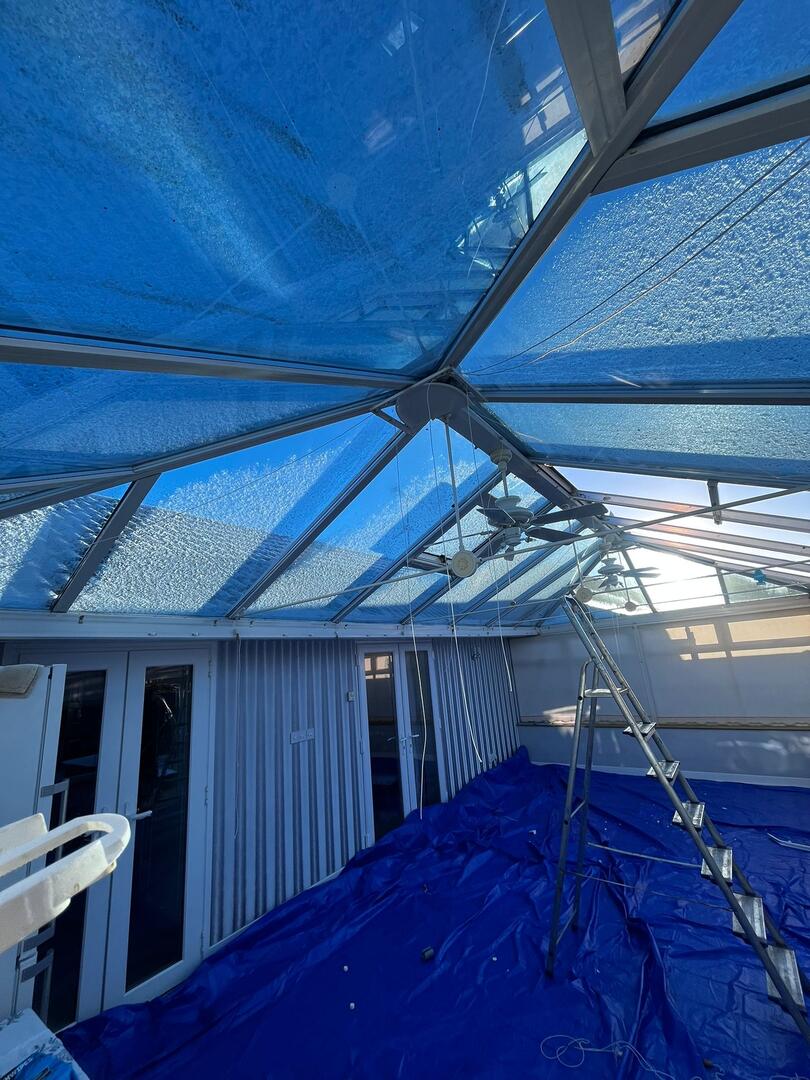 Edwardian conservatory interior before roof transformation — dark and unusable in summer